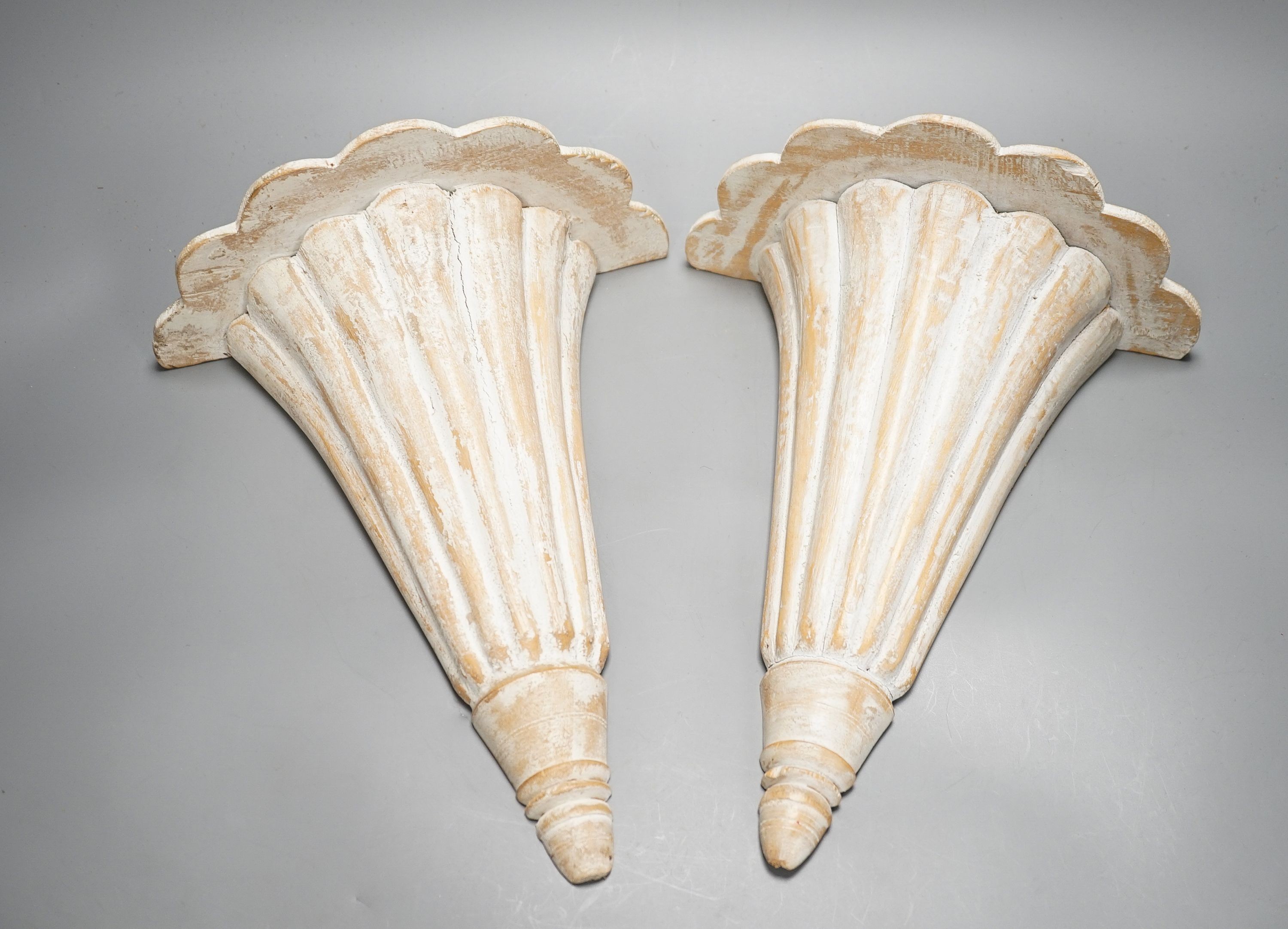 A pair of limed beech wall sconces, height 33cm